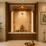 Modern pooja room interior designed as per Vastu with a wooden mandir, warm ambient lighting, brass lamps, and elegant home décor in a contemporary Kerala home.