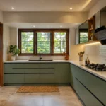 Modern modular kitchen design in a Kerala home with L-shaped cabinets, spacious countertops, storage units, and natural lighting
